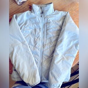 The North Face Primaloft Women's packable jacket light blue size small
